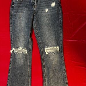 - PacSun Medium to Dark Wash Distressed Flare Jeans